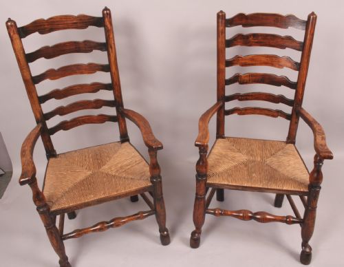 A Good Set of 12 Antique Ladder Back Country Chairs
