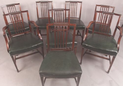 A Set of Eight Sheraton Style Dining Chairs