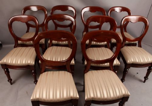 A Set of Ten Victorian Balloon Back Dining Chairs
