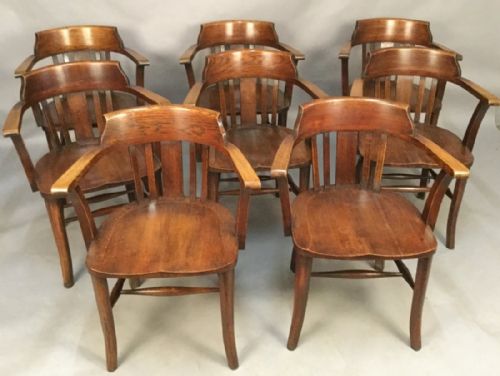 A Set of 8 Captains Chairs in Oak