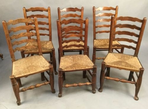 A Harlequin Set of 6 19th Century Ladder Back Dining Chairs