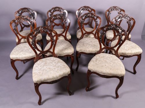 A Set of 10 Victorian Walnut Dining Chairs