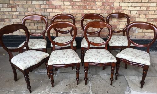 A Set of 8 Victorian Mahogany Balloon Back Dining Chairs