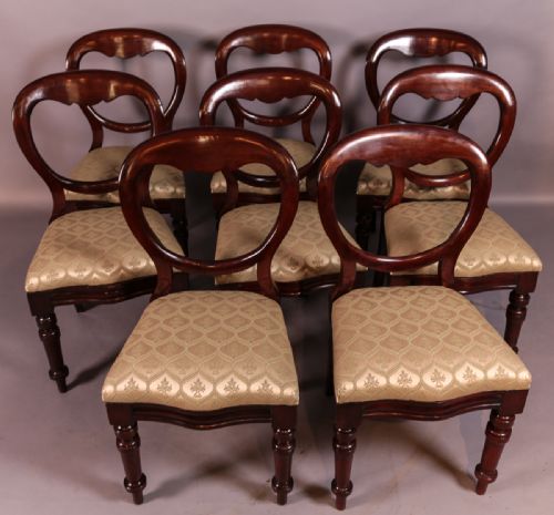 A Set of 8 Victorian Mahogany Balloon Back Dining Chairs