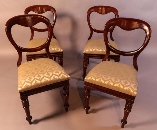 A Set of 4 Victorian Balloon Back Dining Chairs