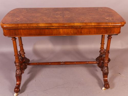 A Superb Victorian Games Table in Burr Walnut with Inlay of Box Wood,
dimensions
width 108cms
depth 53 Cms
height 74 Cms