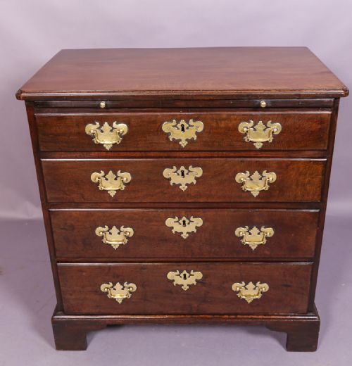 A Good 18th Century George II Chest of Drawers with Slide