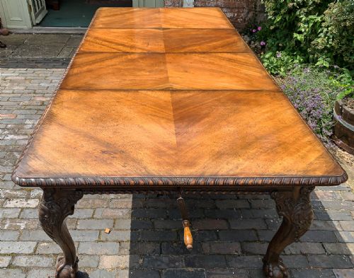 A Good Maples Wind Out Dining Table in Figured Walnut