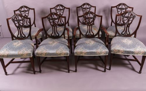 A Set of 8 Nineteenth Century Hepplewhite Dining Chairs