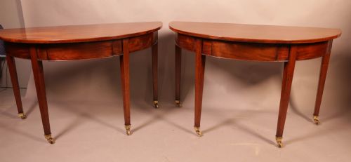 A Pair of 18th Century Demi Lune Hall Tables