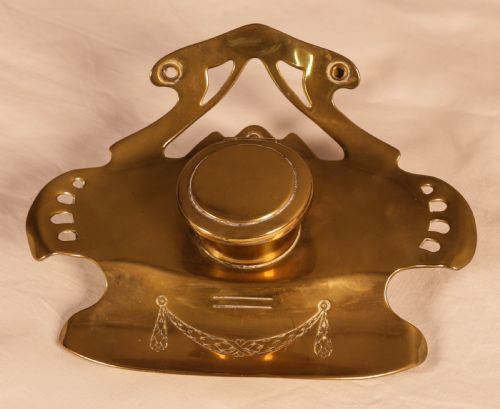 An Art Neuvaux Inkwell in Brass