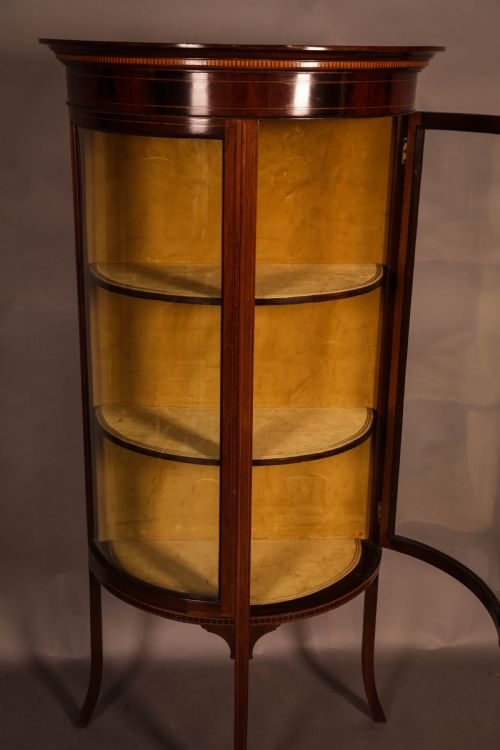A Good Quality Display Cabinet with Bow Glass Doors
