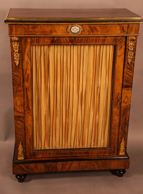 A Victorian Walnut Pier Cabinet