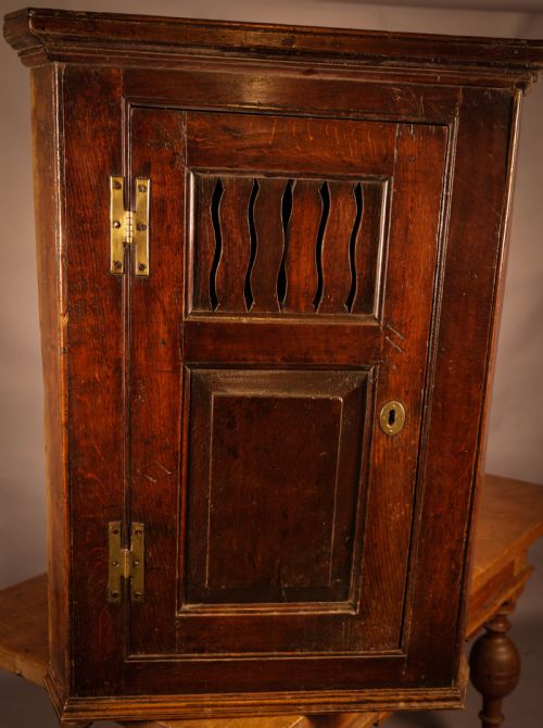 An Interesting Oak Corner Cupboard Georgian