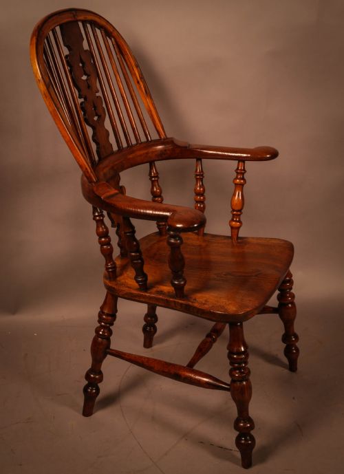 A Worksop Yew Wood Broad Arm Windsor Chair