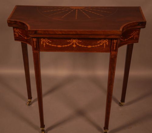 A Fine Georgian Card Table in Mahogany with Inlay