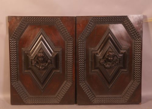A Pair of Oak Door Panels Carved Heads