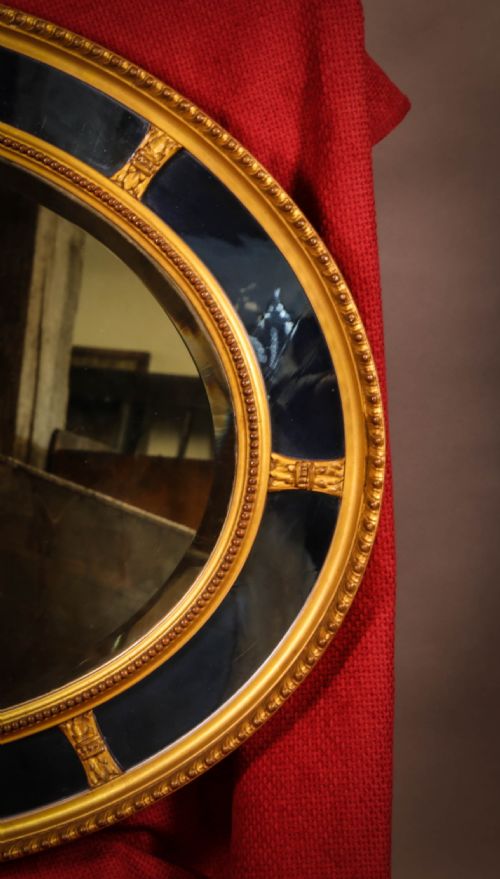 AN OVAL MIRROR SEGMENTED WITH BLUE GLASS RARE - ADDITIONAL PHOTO 1