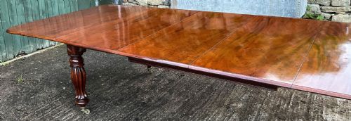 A GOOD EARLY 19TH CENTURY EXTENDING DINING TABLE IN MAHOGANY - ADDITIONAL PHOTO 9