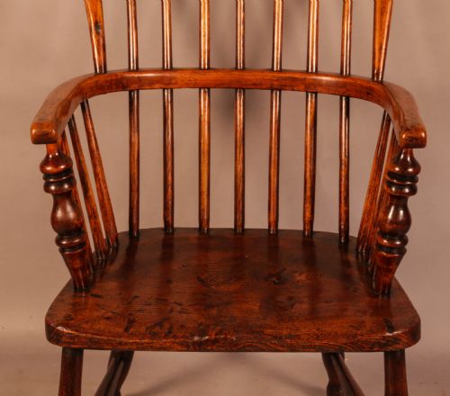 A HIGH BACK WINDSOR CHAIR IN ASH AND ELM - ADDITIONAL PHOTO 3