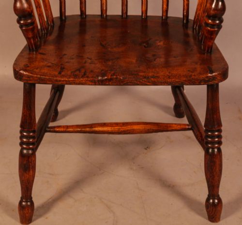A HIGH BACK WINDSOR CHAIR IN ASH AND ELM - ADDITIONAL PHOTO 4