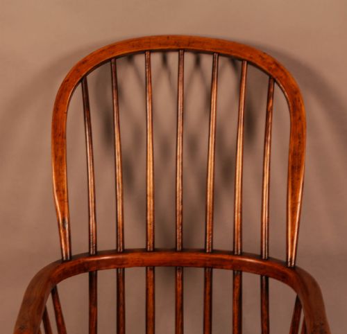 A HIGH BACK WINDSOR CHAIR IN ASH AND ELM - ADDITIONAL PHOTO 5