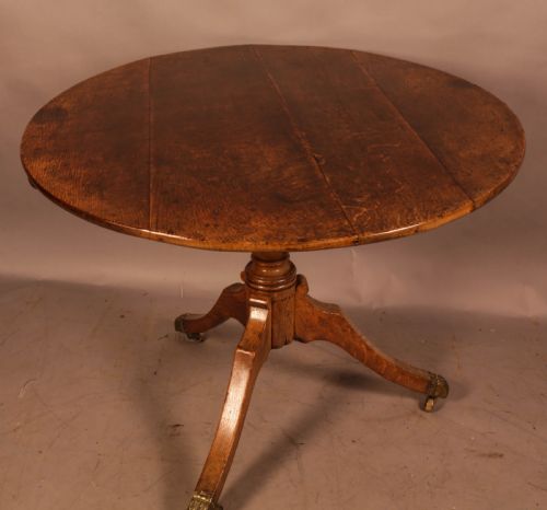 A Large Oak Tripod Supper Table