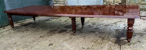 A SUPERB EARLY VICTORIAN WIND OUT EXTENDING DINING TABLE MAHOGANY - ADDITIONAL PHOTO 2