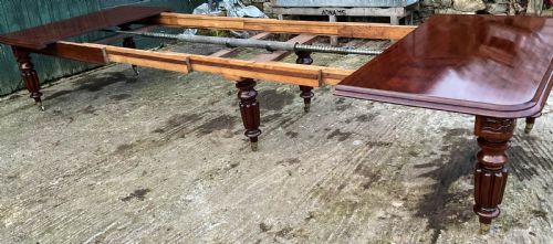 A SUPERB EARLY VICTORIAN WIND OUT EXTENDING DINING TABLE MAHOGANY - ADDITIONAL PHOTO 4