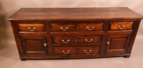a georgian serving dresser in oak - CATEGORY: ANTIQUE SIDEBOARDS - DATED 18TH CENTURY