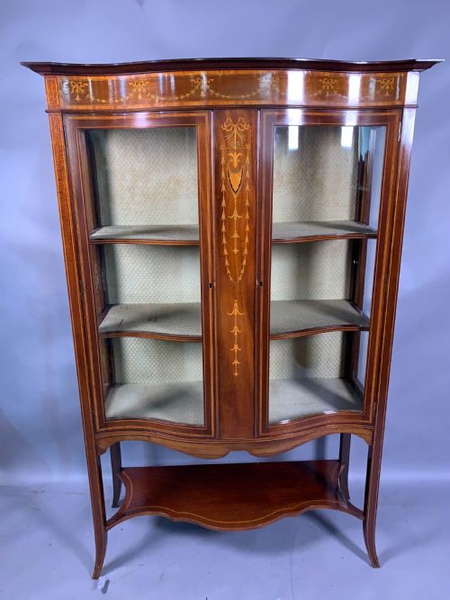 a late victorian mahogany with inlay serpentine shape display cabinet - CATEGORY: ANTIQUE CABINETS - DATED VICTORIAN