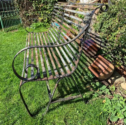 A WROUGHT IRON GARDEN BENCH OLD PAINT - ADDITIONAL PHOTO 3