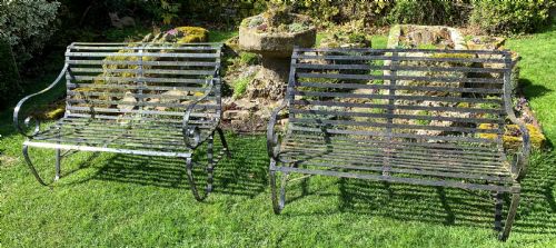 a rare matching pair of wrought iron garden benches - CATEGORY: ANTIQUE FURNITURE - DATED 1900