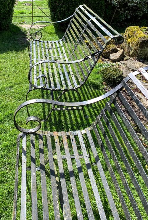A RARE MATCHING PAIR OF WROUGHT IRON GARDEN BENCHES - ADDITIONAL PHOTO 5