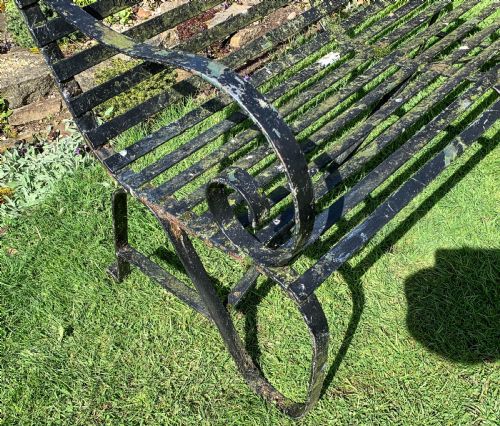 A RARE MATCHING PAIR OF WROUGHT IRON GARDEN BENCHES - ADDITIONAL PHOTO 8