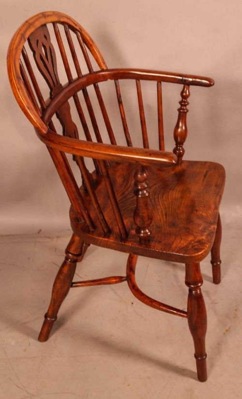 A YEW WOOD LOW BACK WINDSOR IN YEW