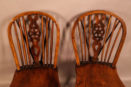 A PAIR OF WHEELBACK KITCHEN CHAIRS C 1860 - ADDITIONAL PHOTO 1