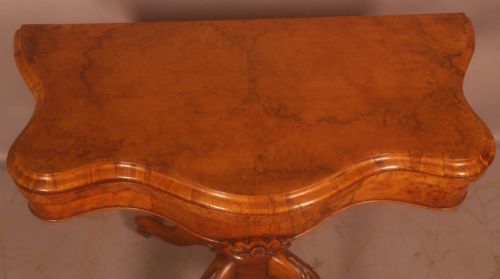 A VICTORIAN BURR WALNUT GAMES TABLE - ADDITIONAL PHOTO 1