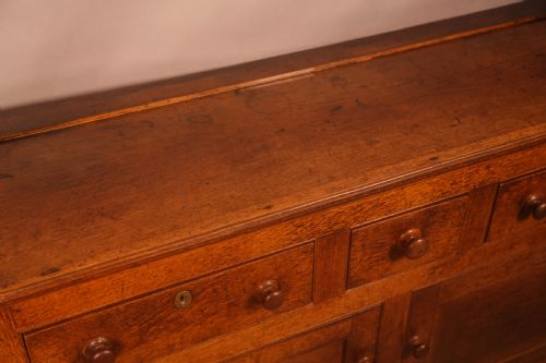 A SMALL GEORGIAN SERVING DRESSER IN OAK - ADDITIONAL PHOTO 7