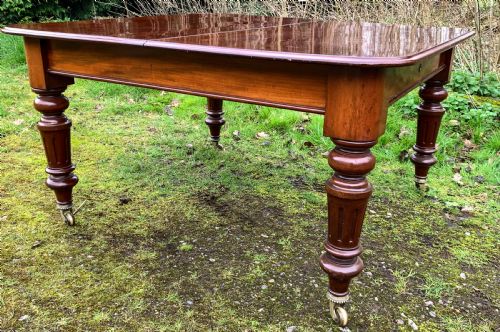 A GOOD VICTORIAN 2 LEAF EXTENING DINING TABLE IN MAHOGANY - ADDITIONAL PHOTO 11
