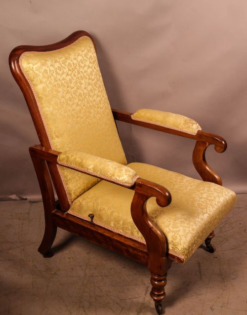 AN EARLY VICTORIAN RECLINING ARMCHAIR - ADDITIONAL PHOTO 1