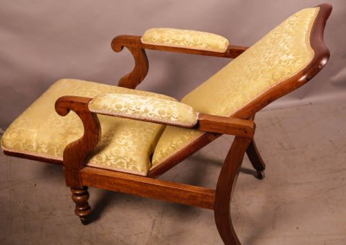 AN EARLY VICTORIAN RECLINING ARMCHAIR - ADDITIONAL PHOTO 5
