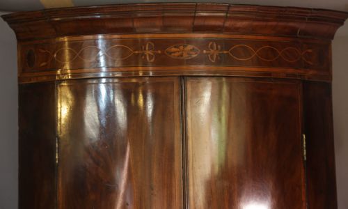 A GEORGIAN BOW FRONT CORNER CUPBOARD MAHOGANY INLAID - ADDITIONAL PHOTO 2