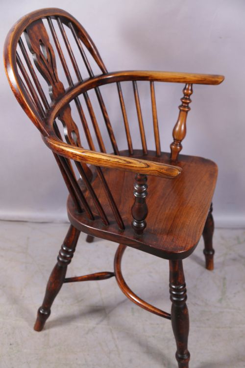 AN ASH AND ELM WINDSOR CHAIR STAMPED FRED WALKER