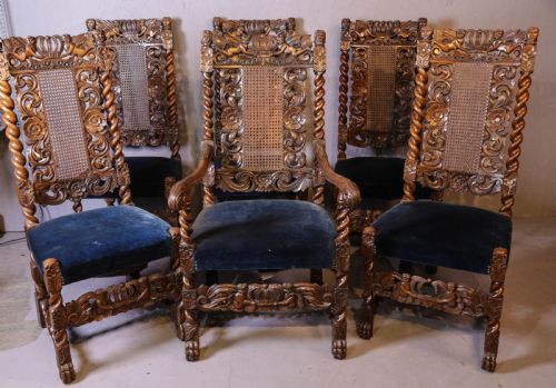 A SET OF 6 CAROLEON STYLE CHAIRS HEAVILY CARVED WALNUT