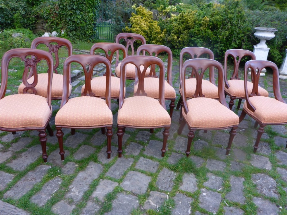 A Set of 9 plus 3 Victorian Mahogany Dining Chairs