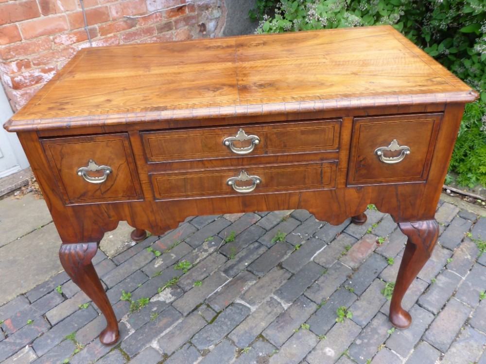 A Good George II Walnut Dressing Table Cabriole legs