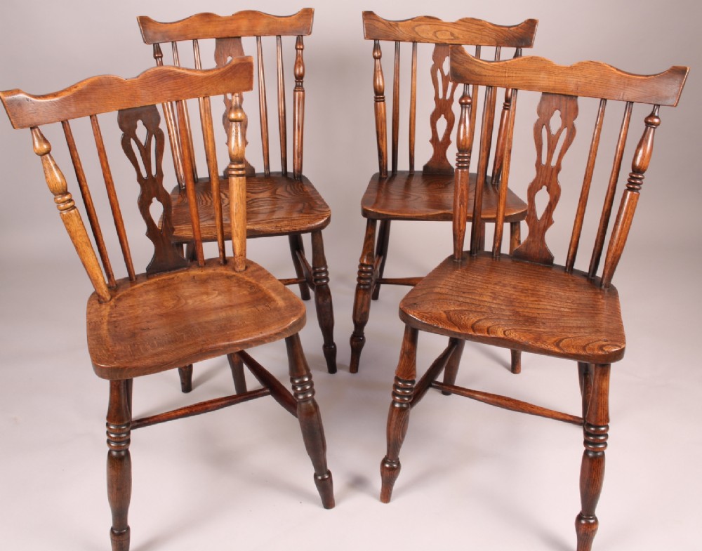 An Attractive Harlequin set of Kitchen Chairs