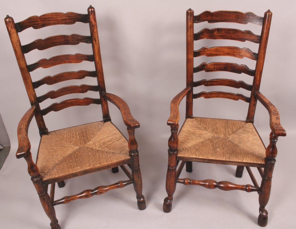 A Good Set of 12 Antique Ladder Back Country Chairs