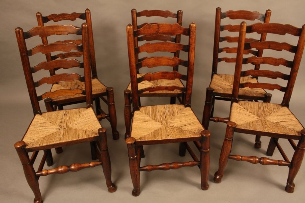A Harlequin set of Six 19th century Ladder Back Chairs